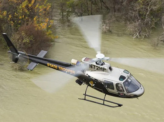 Ohio State Patrol AStar helicopter flying over river