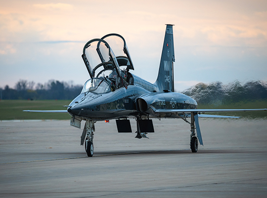 USAF T-38 Talon parked on ramp with open canopy